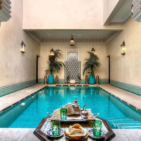 马拉喀什 里亚德克尼莎摩洛哥传统庭院酒店 游泳池 照片 The swimming pool at the hotel